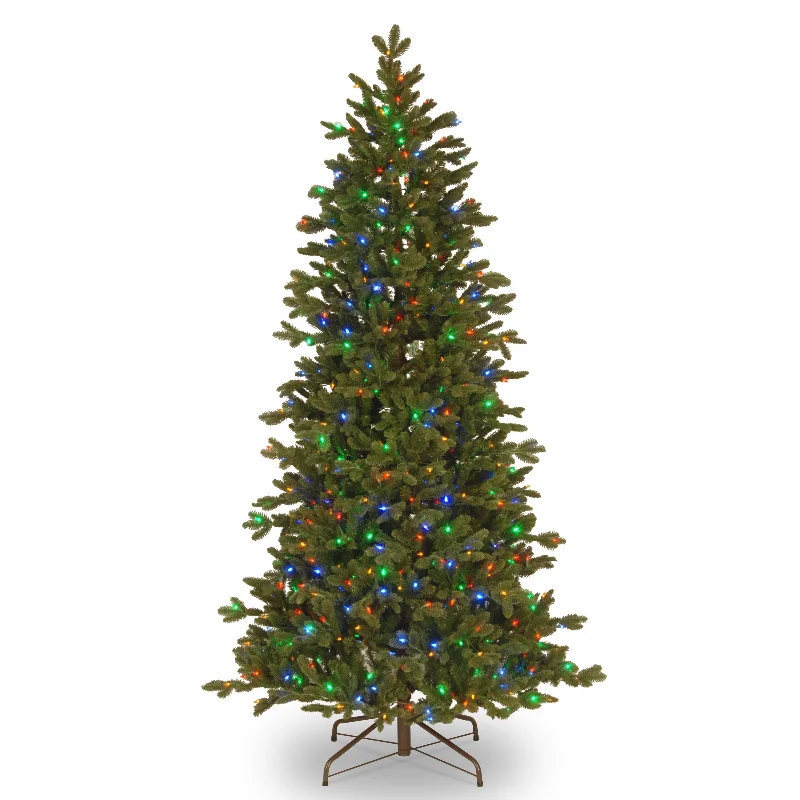 Christmas Family Traditions 9.5 ft. Pre-Lit Noble Deluxe Fir Slim Tree with Multicolor LED Lights Christmas Family Traditions 9.5 ft. Pre-Lit Noble Deluxe Fir Slim Tree with Multicolor LED Lights