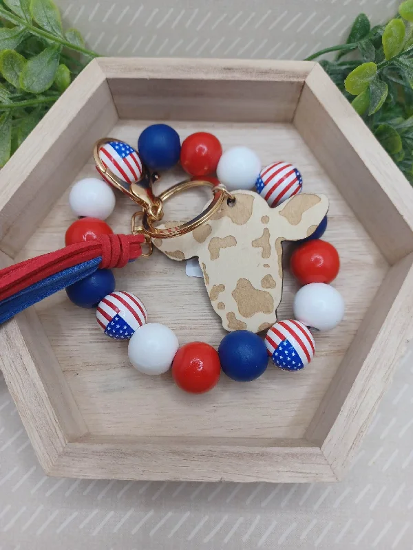 Christmas Warming Cocoa Sips Red, White, Blue, & American Flag Beaded Wristlet w/ Tassel & Wooden Cow