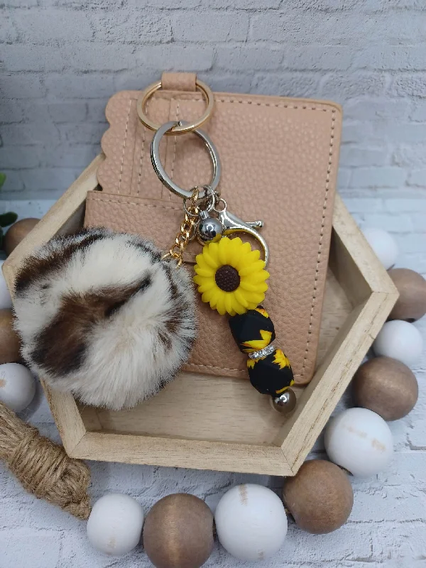 Christmas Twinkling Festive Lights Tan Colored Wallet w/ Beaded Sunflower Keychain & Pom Pom Keychain Christmas Twinkling Festive Lights Tan Colored Wallet w/ Beaded Sunflower Keychain & Pom Pom Keychain
