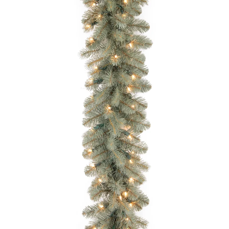 Christmas Fireplace Mantel 9 ft. Pre-Lit Downswept Douglas Blue Garland with Clear Lights Christmas Fireplace Mantel 9 ft. Pre-Lit Downswept Douglas Blue Garland with Clear Lights